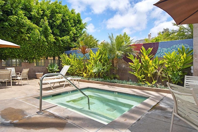 12672 Carmel Country Rd Unit 51, San Diego, CA 92130 - view of swimming pool featuring a community hot tub, a patio, a pool, and outdoor dining space