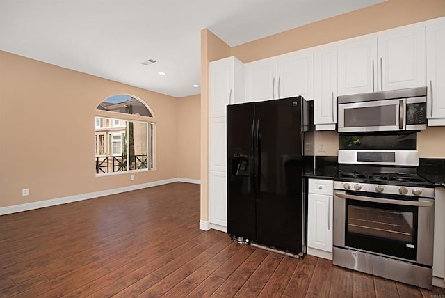 12672 Carmel Country Rd Unit 51, San Diego, CA 92130 - kitchen featuring stainless steel appliances, dark countertops, dark wood finished floors, white cabinets, and recessed lighting