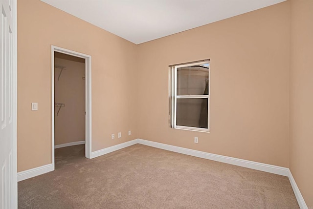 12672 Carmel Country Rd Unit 51, San Diego, CA 92130 - carpeted empty room featuring baseboards