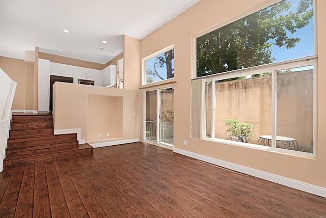 12672 Carmel Country Rd Unit 51, San Diego, CA 92130 - spare room with dark wood-style floors, stairs, and recessed lighting