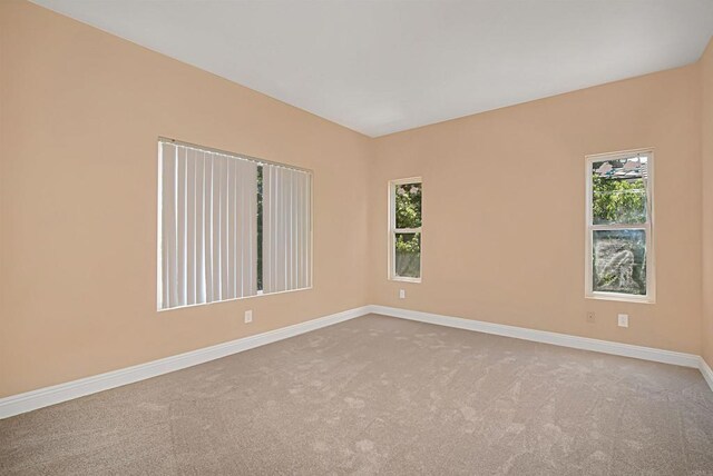 12672 Carmel Country Rd Unit 51, San Diego, CA 92130 - carpeted empty room with baseboards