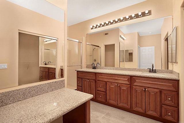 12672 Carmel Country Rd Unit 51, San Diego, CA 92130 - bathroom featuring a shower stall and double vanity