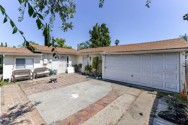 1500 E Topeka St, Pasadena, CA 91104 - ranch-style home with an attached garage and driveway
