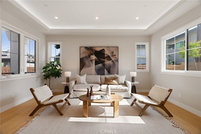 6023 Kauffman Ave, Temple City, CA 91780 - living area featuring wood finished floors, a raised ceiling, and recessed lighting