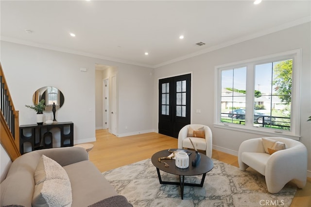 6023 Kauffman Ave, Temple City, CA 91780 - living area featuring light wood finished floors, recessed lighting, ornamental molding, and stairway