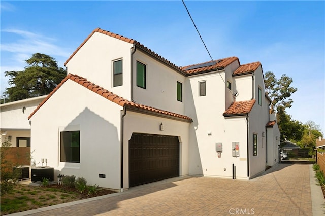 6023 Kauffman Ave, Temple City, CA 91780 - view of front of house featuring a garage, solar panels, a tile roof, and decorative driveway