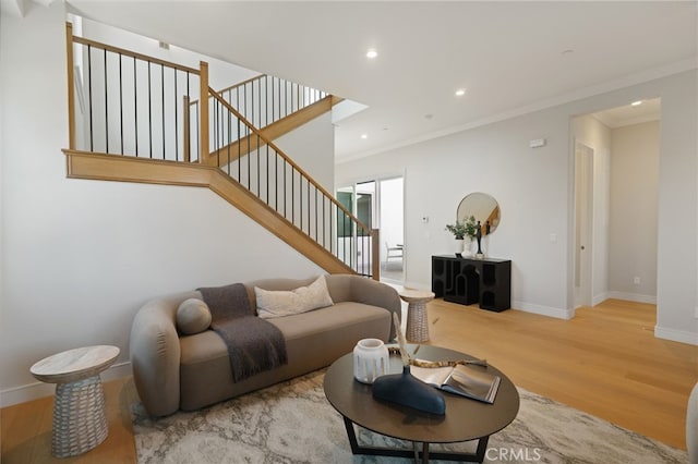 6023 Kauffman Ave, Temple City, CA 91780 - living room with stairs, wood finished floors, ornamental molding, and recessed lighting