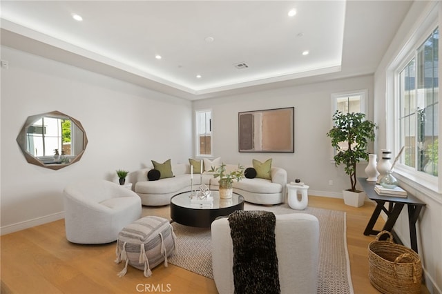 6023 Kauffman Ave, Temple City, CA 91780 - living area featuring plenty of natural light, light wood-style flooring, recessed lighting, and a tray ceiling