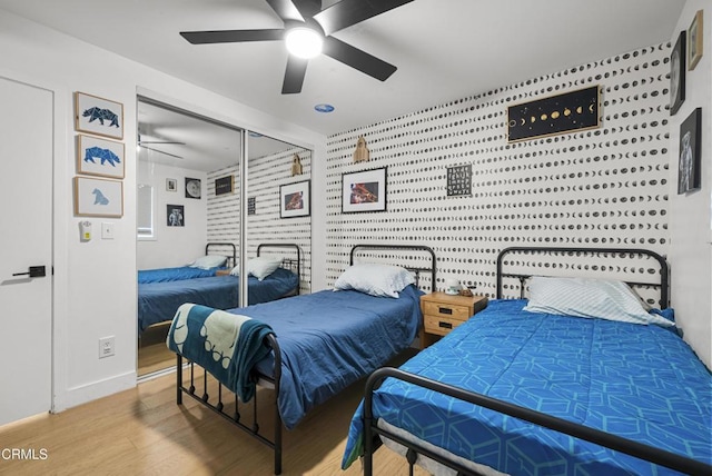 527 Keyser Rondo, Camarillo, CA 93010 - bedroom with wood finished floors, a closet, and a ceiling fan