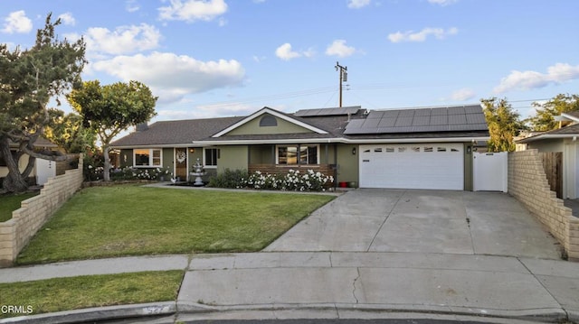 527 Keyser Rondo, Camarillo, CA 93010 - single story home with an attached garage, solar panels, and concrete driveway