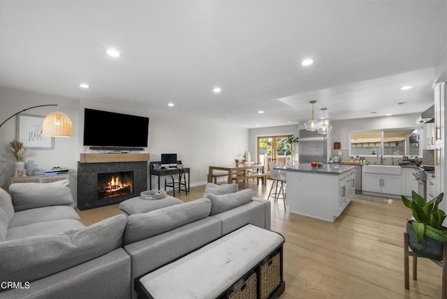 527 Keyser Rondo, Camarillo, CA 93010 - living area with a premium fireplace, recessed lighting, and light wood finished floors
