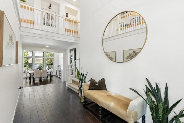 1480 Regatta Rd, Carlsbad, CA 92011 - corridor with stairway, dark wood-style floors, and a high ceiling