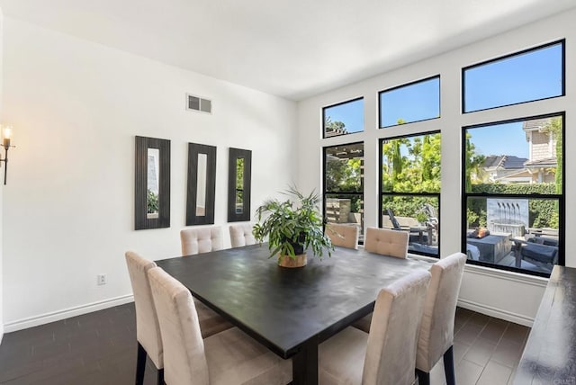 1480 Regatta Rd, Carlsbad, CA 92011 - dining area featuring baseboards and wood finished floors