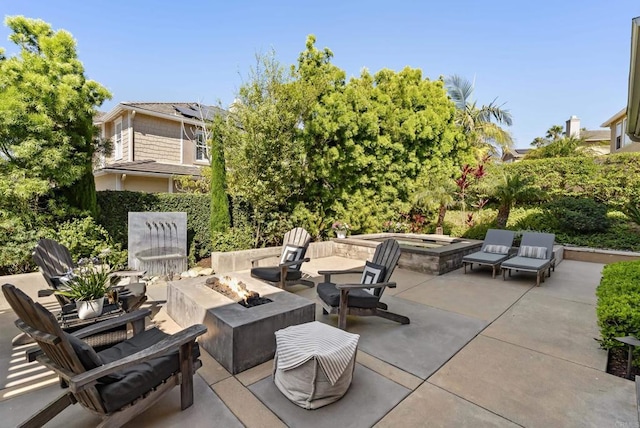 1480 Regatta Rd, Carlsbad, CA 92011 - view of patio with an outdoor living space with a fire pit