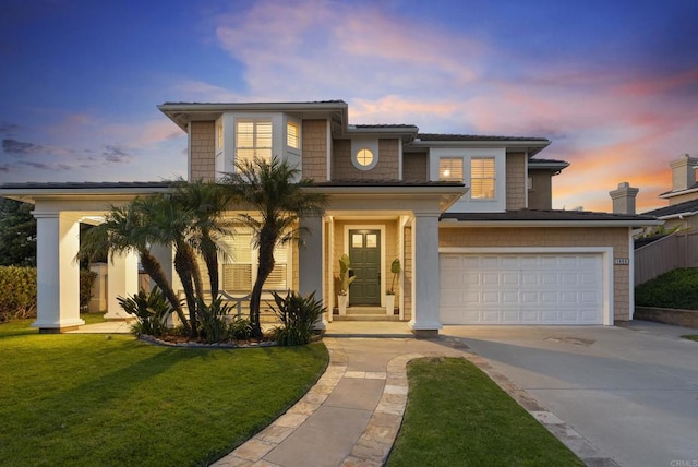 1480 Regatta Rd, Carlsbad, CA 92011 - view of front of house with concrete driveway, an attached garage, and a yard
