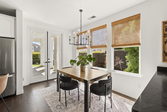 1480 Regatta Rd, Carlsbad, CA 92011 - dining space with dark wood-style floors and french doors