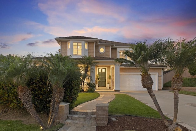 1480 Regatta Rd, Carlsbad, CA 92011 - mediterranean / spanish-style house featuring concrete driveway and a garage