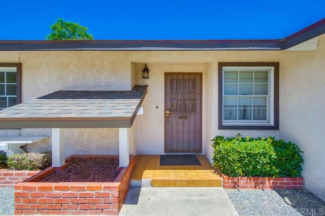 1970 El Prado Ave, Lemon Grove, CA 91945 - doorway to property featuring stucco siding