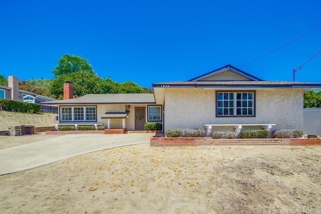 1970 El Prado Ave, Lemon Grove, CA 91945 - ranch-style house with stucco siding and a chimney