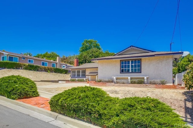 1970 El Prado Ave, Lemon Grove, CA 91945 - ranch-style home with stucco siding and a chimney