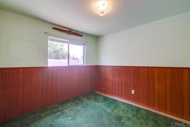 1970 El Prado Ave, Lemon Grove, CA 91945 - carpeted spare room featuring a wainscoted wall and wood walls