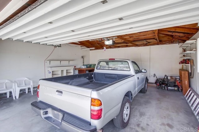1970 El Prado Ave, Lemon Grove, CA 91945 - garage featuring a garage door opener