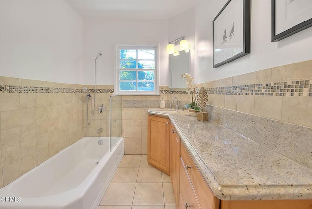 3671 Grayburn Rd, Pasadena, CA 91107 - bathroom with vanity, tile walls, tile patterned floors, bathtub / shower combination, and wainscoting