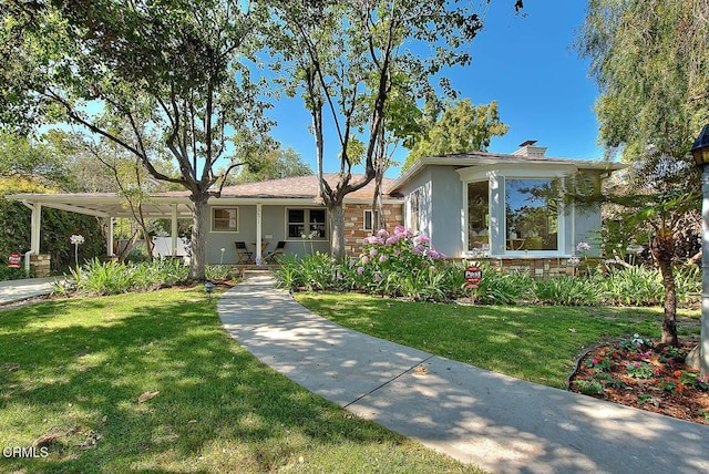 3671 Grayburn Rd, Pasadena, CA 91107 - view of front of property with a front yard, stucco siding, and an attached carport