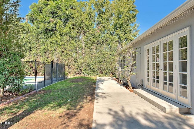 3671 Grayburn Rd, Pasadena, CA 91107 - view of yard featuring french doors and a patio area