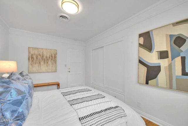 3671 Grayburn Rd, Pasadena, CA 91107 - bedroom with a closet, wood finished floors, and ornamental molding