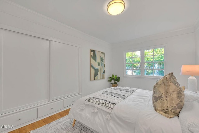 3671 Grayburn Rd, Pasadena, CA 91107 - bedroom featuring ornamental molding and wood finished floors