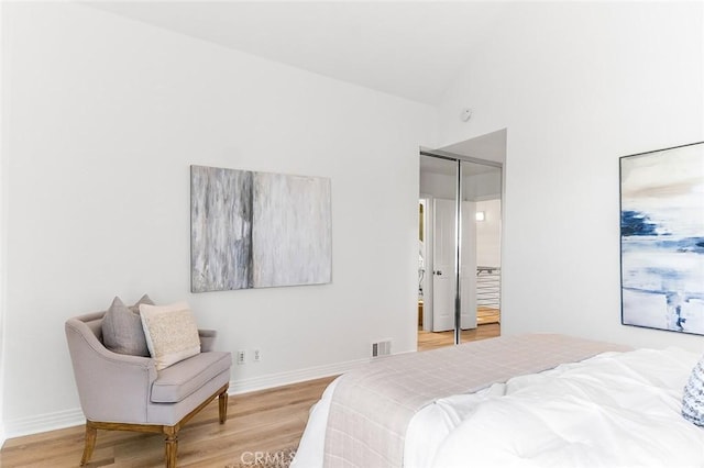 3496 Windspun, Huntington Beach, CA 92649 - bedroom featuring wood finished floors and lofted ceiling