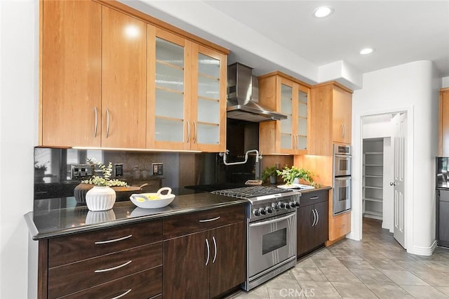 3496 Windspun, Huntington Beach, CA 92649 - kitchen featuring stainless steel appliances, wall chimney exhaust hood, backsplash, glass insert cabinets, and recessed lighting