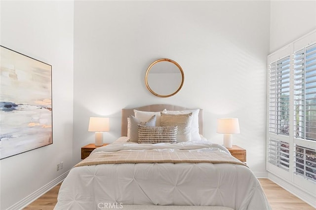 3496 Windspun, Huntington Beach, CA 92649 - bedroom featuring light wood-type flooring and baseboards