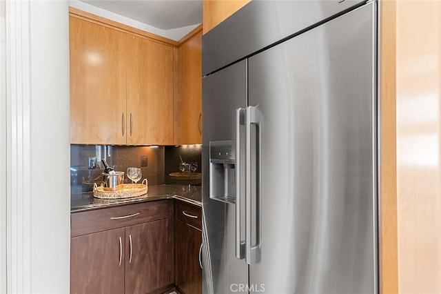 3496 Windspun, Huntington Beach, CA 92649 - kitchen with high end refrigerator, decorative backsplash, and dark countertops
