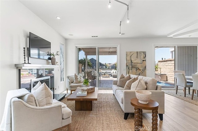 3496 Windspun, Huntington Beach, CA 92649 - living area with plenty of natural light and wood finished floors