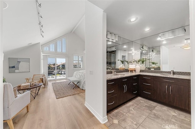 3496 Windspun, Huntington Beach, CA 92649 - bar with vaulted ceiling, track lighting, light wood-type flooring, and recessed lighting