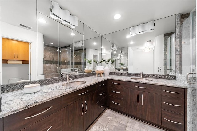 3496 Windspun, Huntington Beach, CA 92649 - full bath featuring a shower stall, double vanity, and tile patterned flooring
