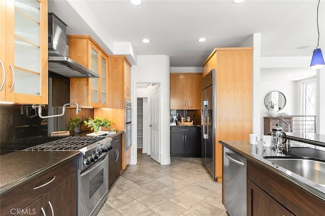 3496 Windspun, Huntington Beach, CA 92649 - kitchen with stainless steel appliances, wall chimney exhaust hood, tasteful backsplash, dark countertops, and recessed lighting