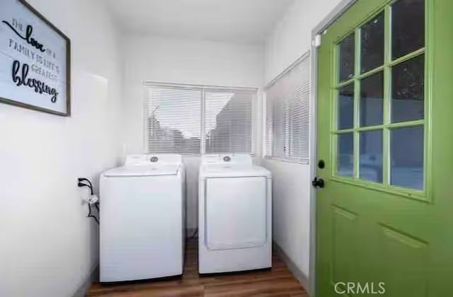 5743 Magnolia Ave, Riverside, CA 92506 - laundry room featuring washer and dryer and dark wood finished floors