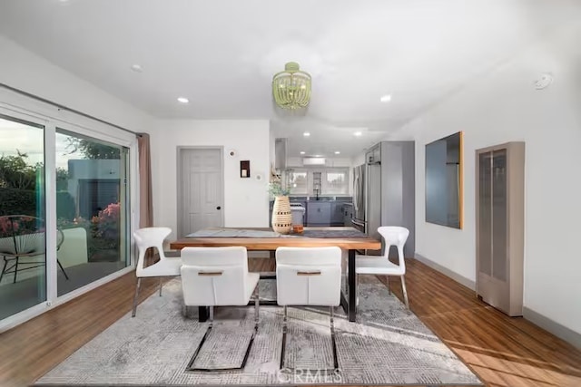 5743 Magnolia Ave, Riverside, CA 92506 - dining area featuring a chandelier, wood finished floors, and recessed lighting