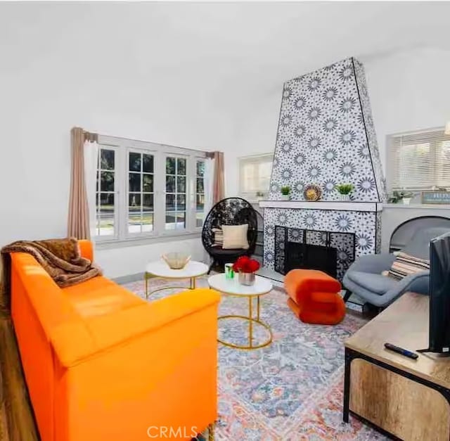 5743 Magnolia Ave, Riverside, CA 92506 - sitting room featuring a tile fireplace and healthy amount of natural light