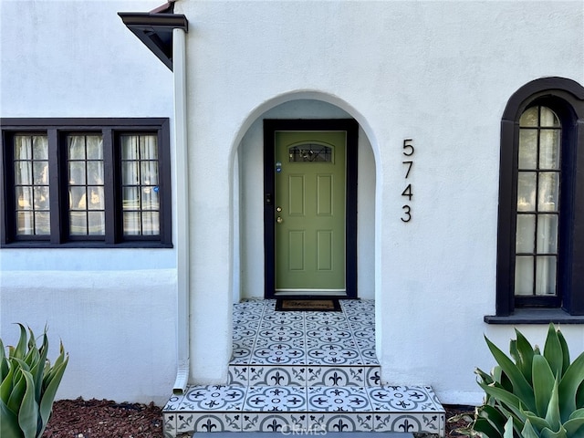 5743 Magnolia Ave, Riverside, CA 92506 - doorway to property with stucco siding