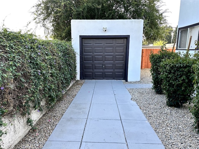 5743 Magnolia Ave, Riverside, CA 92506 - garage featuring concrete driveway