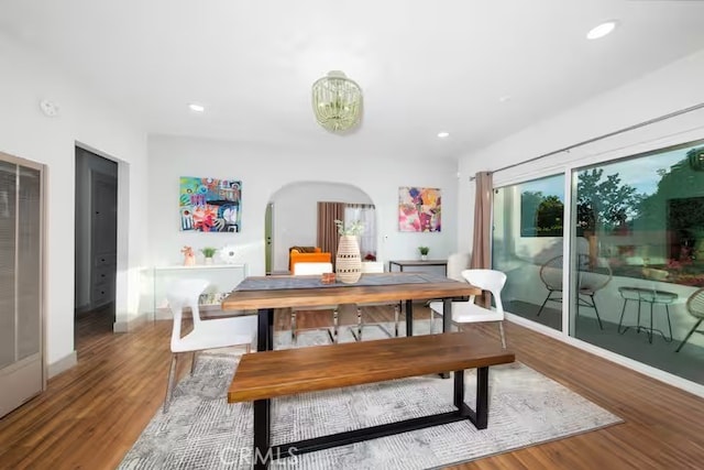 5743 Magnolia Ave, Riverside, CA 92506 - dining room with arched walkways, wood finished floors, and recessed lighting