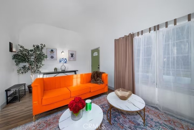 5743 Magnolia Ave, Riverside, CA 92506 - living area featuring wood finished floors and baseboards