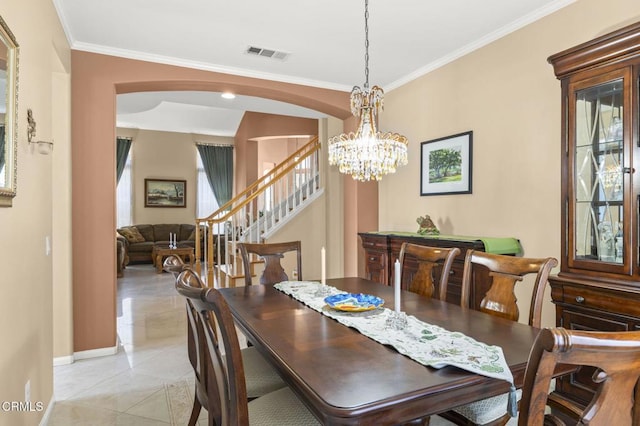 1776 Marsala Way, Camarillo, CA 93012 - dining room with ornamental molding, stairs, arched walkways, light tile patterned flooring, and a chandelier