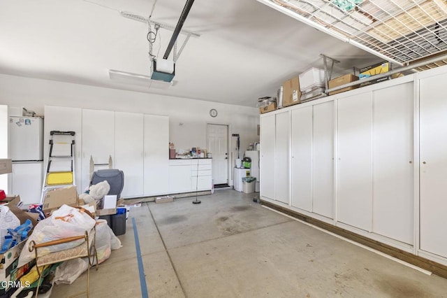1776 Marsala Way, Camarillo, CA 93012 - garage featuring freestanding refrigerator and a garage door opener