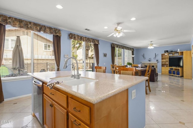 1776 Marsala Way, Camarillo, CA 93012 - kitchen with a ceiling fan, stainless steel dishwasher, crown molding, a kitchen island with sink, and light tile patterned floors