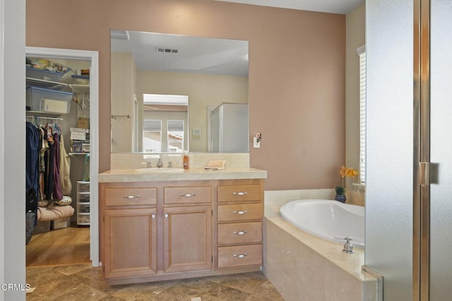 1776 Marsala Way, Camarillo, CA 93012 - full bathroom with a bath, vanity, a shower stall, and a walk in closet